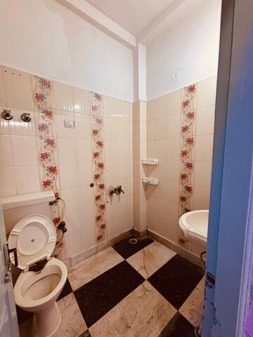Bathroom in 3 BHK Apartment at Shakti Khand iv – for Rent