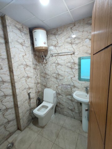 Bathroom in 3 BHK Builder Floor at Risland Sky Mansion, Chattarpur – for Rent