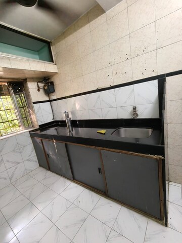 Kitchen in 1 BHK Apartment at Alaknanda CHS Nerul, Nerul Sector 19a – for Rent