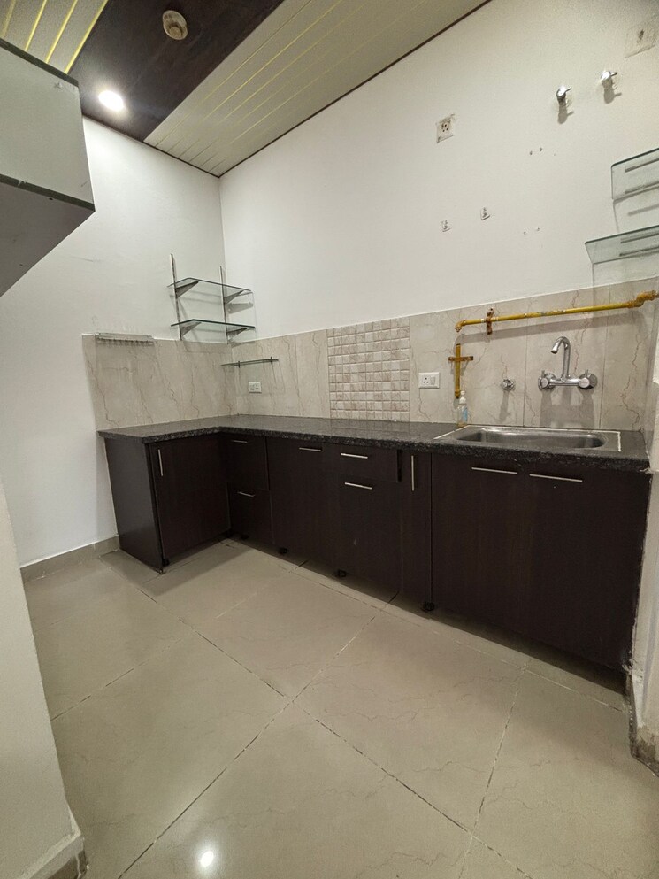 Kitchen, spring-meadows 2.5 Bedroom 970 Sq.Ft. Apartment In Tech Zone 4 Greater Noida Greater Noida 9402211