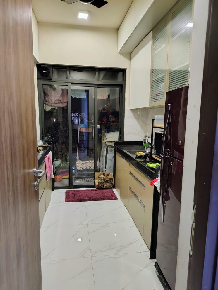 Kitchen, lodha-sterling 3 Bedroom 1042 Sq.Ft. Apartment In Kolshet Road Thane 9402463