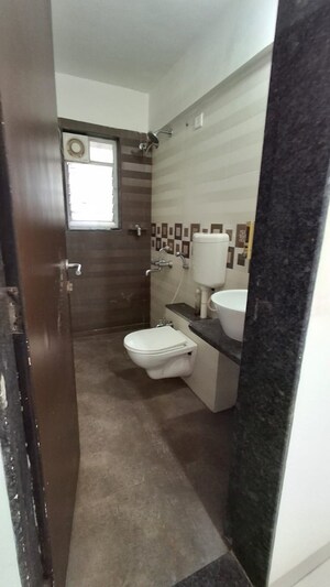 Bathroom in 2 BHK Apartment at Mohite Paradise G, Anand Nagar – for Rent
