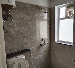 Bathroom in 3 BHK Apartment at International Airport Road – for Rent