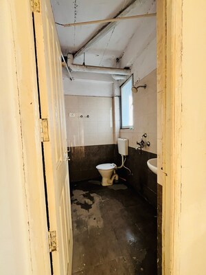 Bathroom in 2 BHK Apartment at Milan Earth, Raj Nagar Extension – for Sale