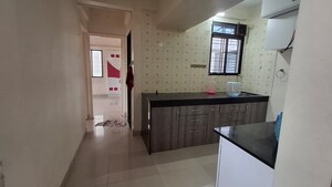 Kitchen in 2 BHK Apartment at Ramkrishna Paradise, Dhayari – for Rent