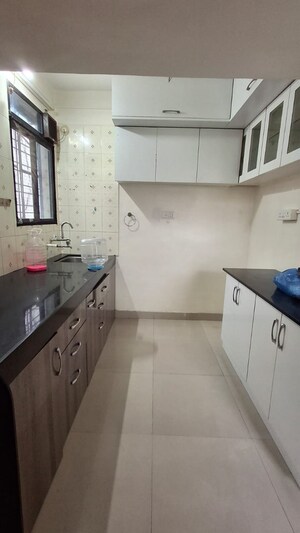 Kitchen in 2 BHK Apartment at Ramkrishna Paradise, Dhayari – for Rent