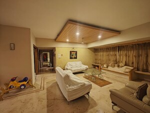 Living Room in 4 BHK Apartment at Khar West – for Rent