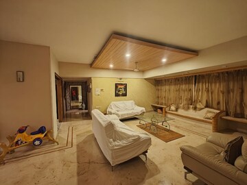 Living Room in 4 BHK Apartment at Khar West – for Rent
