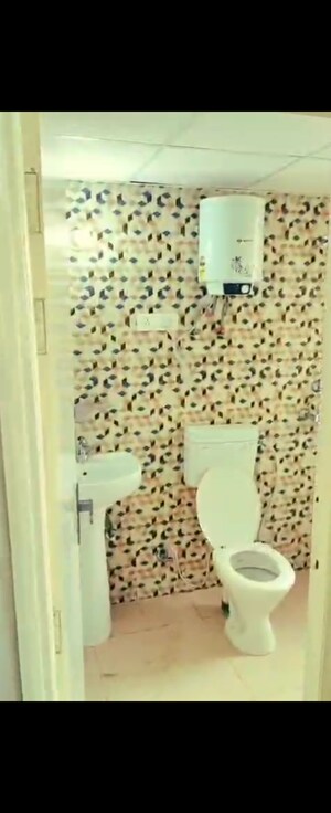 Bathroom in 1 BHK Apartment at Nilaya Greens, Raj Nagar Extension – for Rent