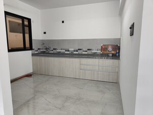Kitchen in 2 BHK Apartment at Unique Youtopia, Kharadi – for Rent
