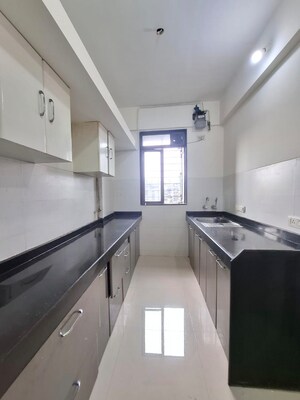 Kitchen in 2 BHK Apartment at Lodha Paradise, Majiwada – for Rent
