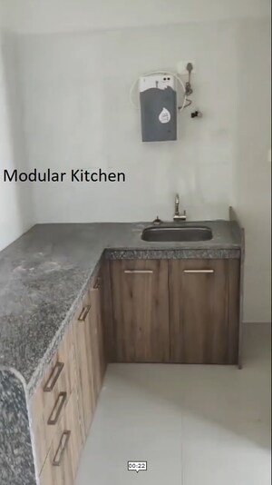 Kitchen in 1 BHK Apartment at Duville Riverdale Heights, Kharadi – for Rent