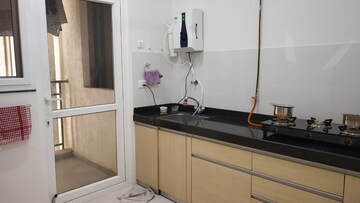 Kitchen in 2 BHK Apartment at Godrej Infinity, Keshav Nagar – for Sale
