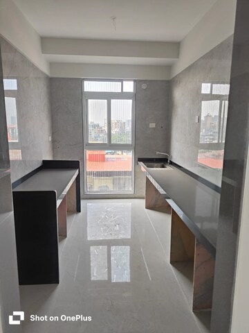 Kitchen in 2 BHK Apartment at Tricity Montview, Sanpada – for Sale