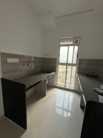 Kitchen in 2 BHK Apartment at Lodha Codename Premier, Dombivli East – for Rent