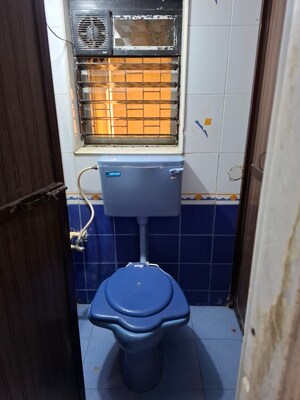 Bathroom in 1 BHK Apartment at Kokil Kunj Apartments, Kandivali West – for Rent