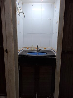 Bathroom in 1 BHK Apartment at Kokil Kunj Apartments, Kandivali West – for Rent