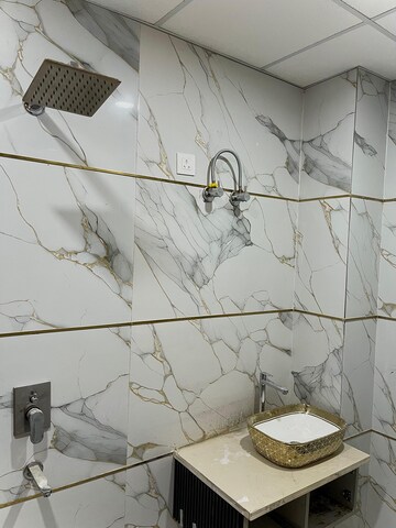 Bathroom in 3 BHK Apartment at Uninav Bliss, Raj Nagar Extension – for Sale