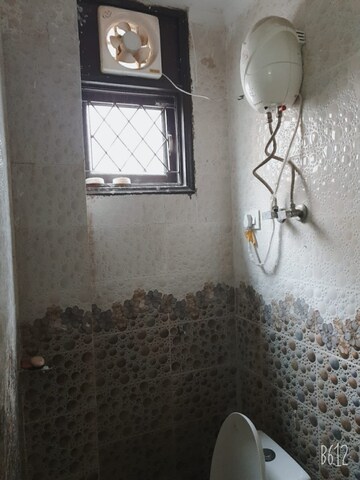 Bathroom in 2 BHK Apartment at Khirki Extension – for Rent