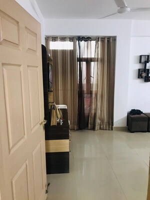 Living Room in 2 BHK Apartment at Supertech Cape Town, Sector 74 – for Rent