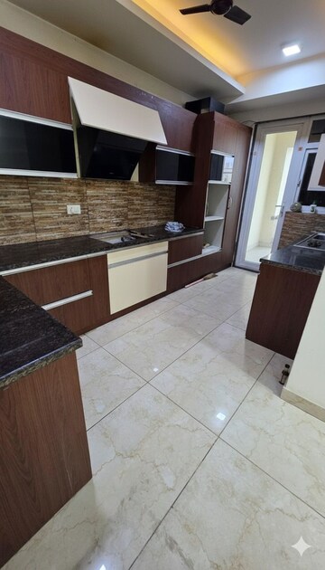 Kitchen in 3.5 BHK Builder Floor at Ansal Sushant Floors, Sushant Lok ii – for Rent