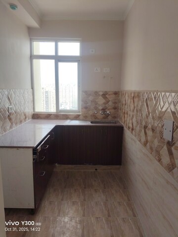 Kitchen in 2.5 BHK Apartment at Panchsheel Greens, Sector 16 Greater Noida – for Rent
