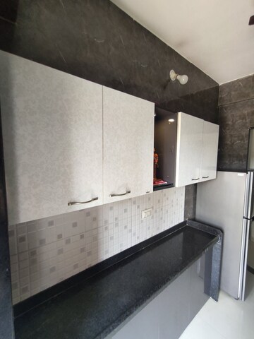 Kitchen in 2 BHK Apartment at Lodha Crown Quality Homes, Majiwada – for Sale