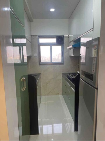 Kitchen in 1 BHK Apartment at Delta Greenville, Kasarvadavali – for Sale