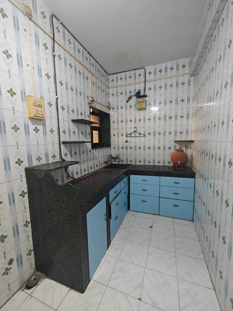 Kitchen, new-palm-beach-chs 2.5 Bedroom 1250 Sq.Ft. Apartment In Nerul Sector 4 Navi Mumbai 9405505