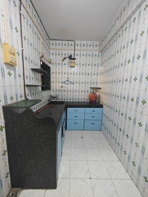 Kitchen in 2.5 BHK Apartment at New Palm Beach CHS, Nerul Sector 4 – for Rent