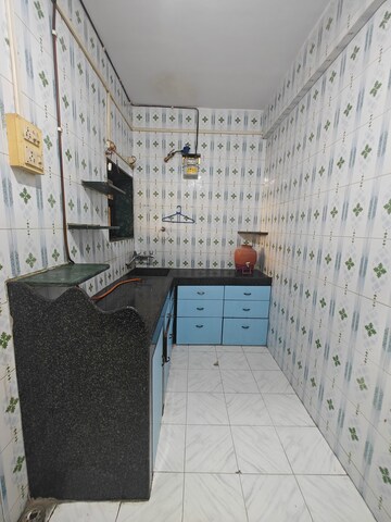 Kitchen in 2.5 BHK Apartment at New Palm Beach CHS, Nerul Sector 4 – for Rent