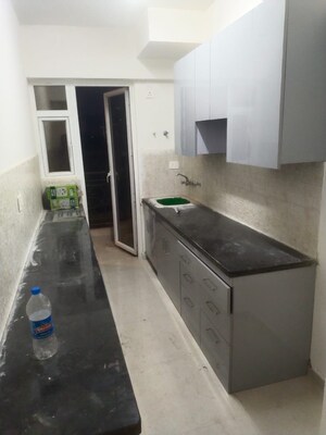 Kitchen in 2 BHK Apartment at Signature Global The Millennia, Sector 37d – for Rent