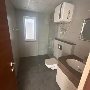 Bathroom in 3 BHK Apartment at Godrej Meridien, Mohammad Heri Village – for Rent
