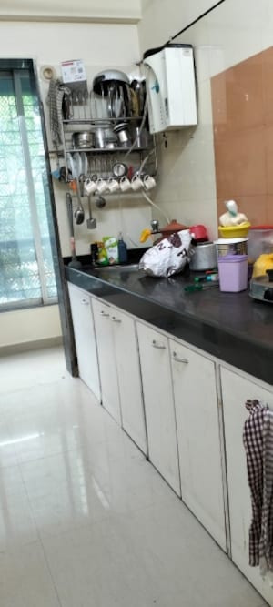 Kitchen in 2 BHK Apartment at Akshita Heights, Mira Road East – for Rent