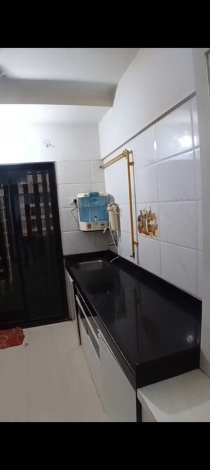 Kitchen in 2 BHK Apartment at Parikh  Peninsula Park, Virar East – for Rent