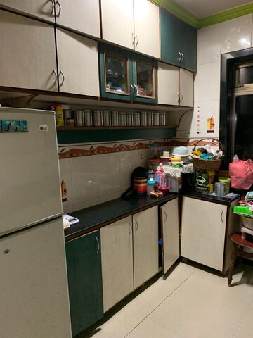 Kitchen in 1 BHK Apartment at Nav Indralok CHS, Ghatkopar East – for Sale