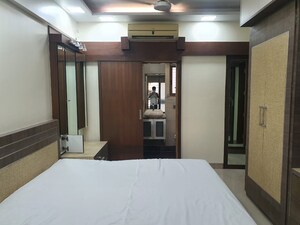 Bedroom in 4 BHK Apartment at Rustomjee Paramount, Khar West – for Sale