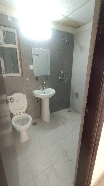Bathroom in 3 BHK Apartment at Prateek Wisteria, Sector 77 – for Rent