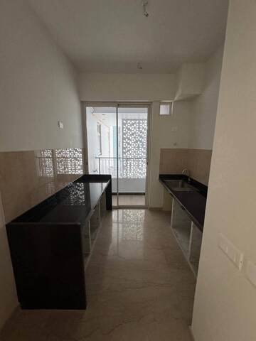 Kitchen in 2 BHK Apartment at Courtyard by Narang Realty and The Wadhwa Group, Pokhran Road No Two – for Rent