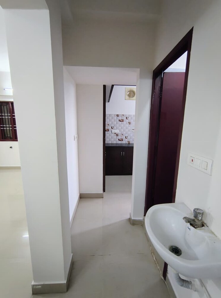 Living Room, golden-isai-rayer-towers 2 Bedroom 821 Sq.Ft. Apartment In Kundrathur Chennai 9405774