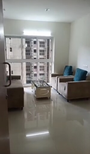 Living Room in 2 BHK Apartment at Lodha Amara, Kolshet Road – for Rent
