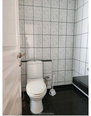 Bathroom in 3 BHK Apartment at Unitech Uniworld Gardens, Sector 47 – for Sale