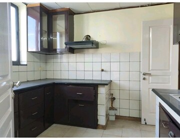 Kitchen in 4 BHK Apartment at Unitech Uniworld Gardens, Sector 47 – for Sale