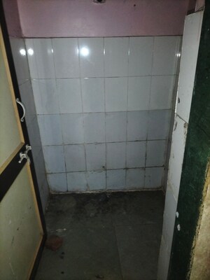 Bathroom in 1 BHK Apartment at Shankar Darshan CHS, Dhankawadi – for Rent