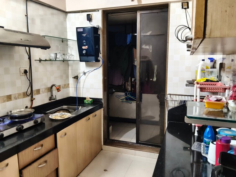 Kitchen, aman-chs-malad-east 1 Bedroom 415 Sq.Ft. Apartment In Malad East Mumbai 9405879