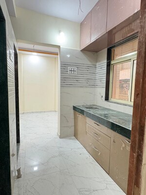 Kitchen in 2 BHK Apartment at Swastik Arcade, Virar West – for Rent