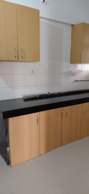 Kitchen in 2 BHK Apartment at Nagpal Dev Exotica, Kharadi – for Rent