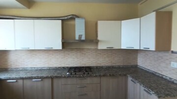 Kitchen in 3 BHK Apartment at Raheja Vedaanta, Sector 108 – for Rent