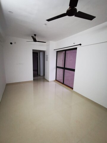 Living Room in 1 BHK Apartment at Lodha Palava Downtown, Dombivli East – for Rent