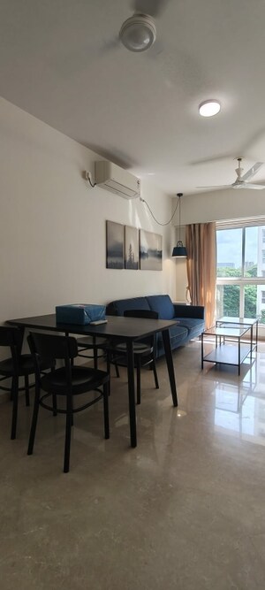 Living Room in 1 BHK Apartment at Godrej The Trees, Vikhroli East – for Rent